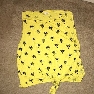 Yellow tank top with palm trees.